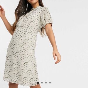 Vila
tea dress with puff sleeves in cream floral ASOS